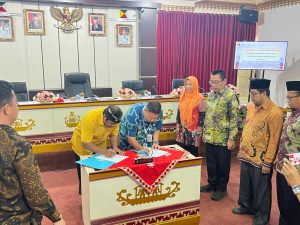 Launching dan Penanda Tanganan Perjanjian Kerja Sama Inovasi Penerbitan Akte Perkawinan Melalui KOTAG di Hadiri PJ Sekda Tanggamus.