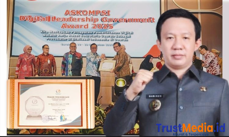 Sekdaprov Lampung Raih Penghargaan ASKOMPSI Digital Leadership Government Award 2025