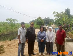 Pembangunan Jalan Rabat beton sepanjang 712,3 m di duga Ruwet